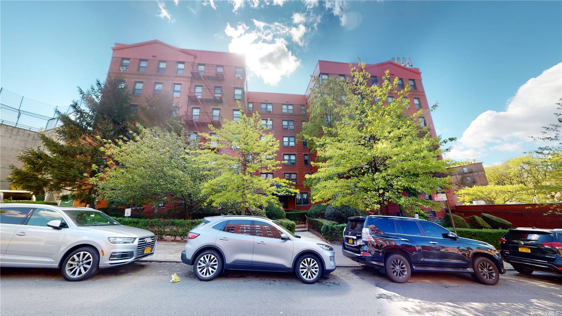 a view of a cars parked in a parking lot