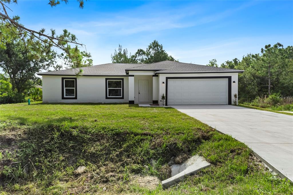 front view of a house with a yard