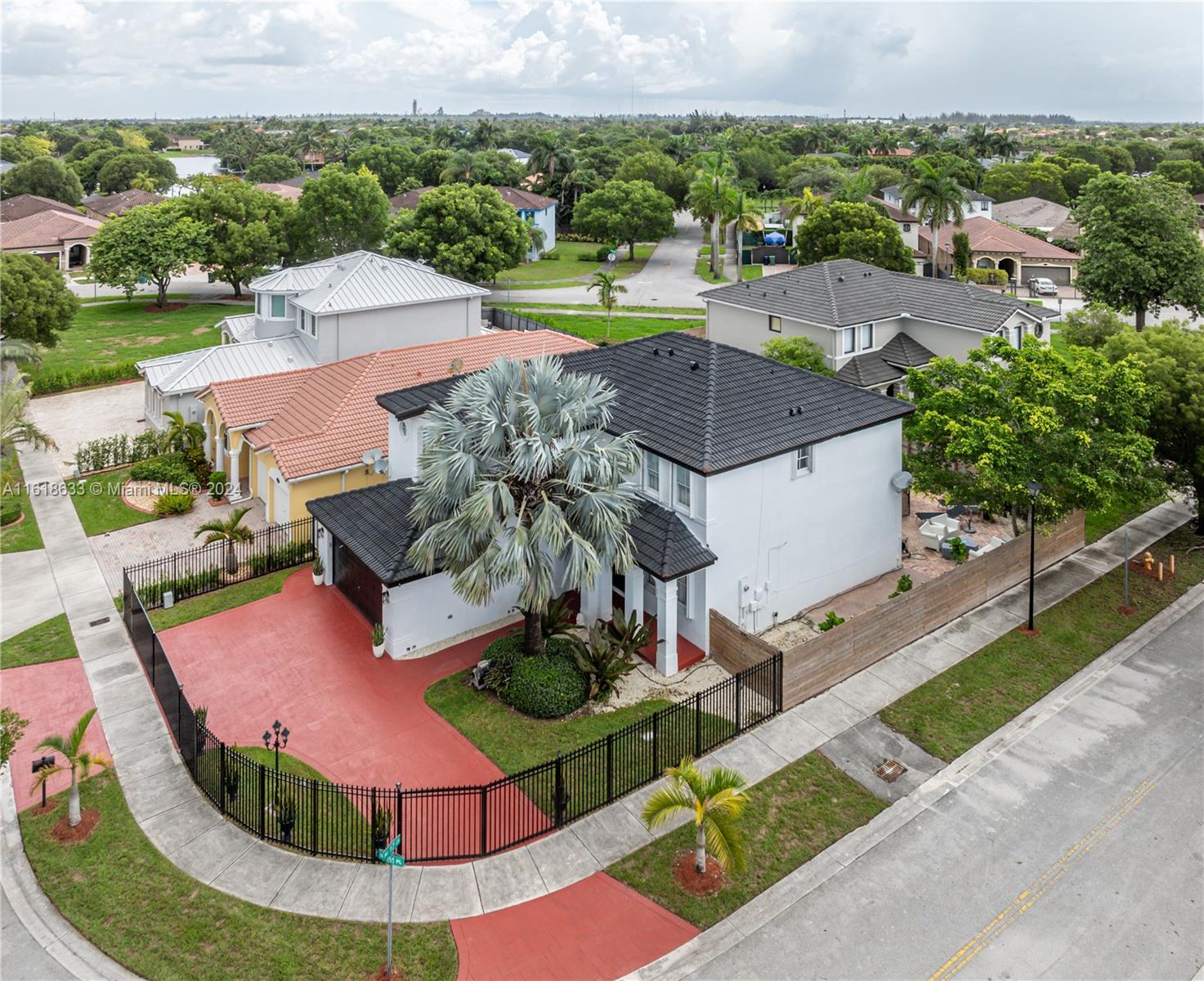 an aerial view of a house with outdoor space