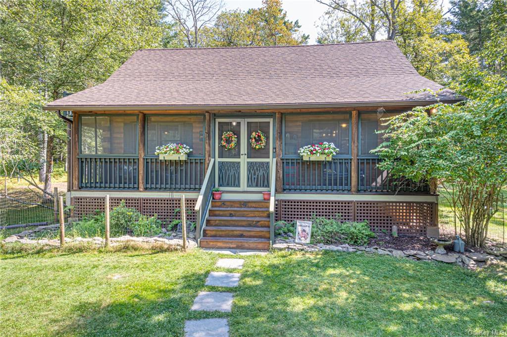 View of front with screened porch