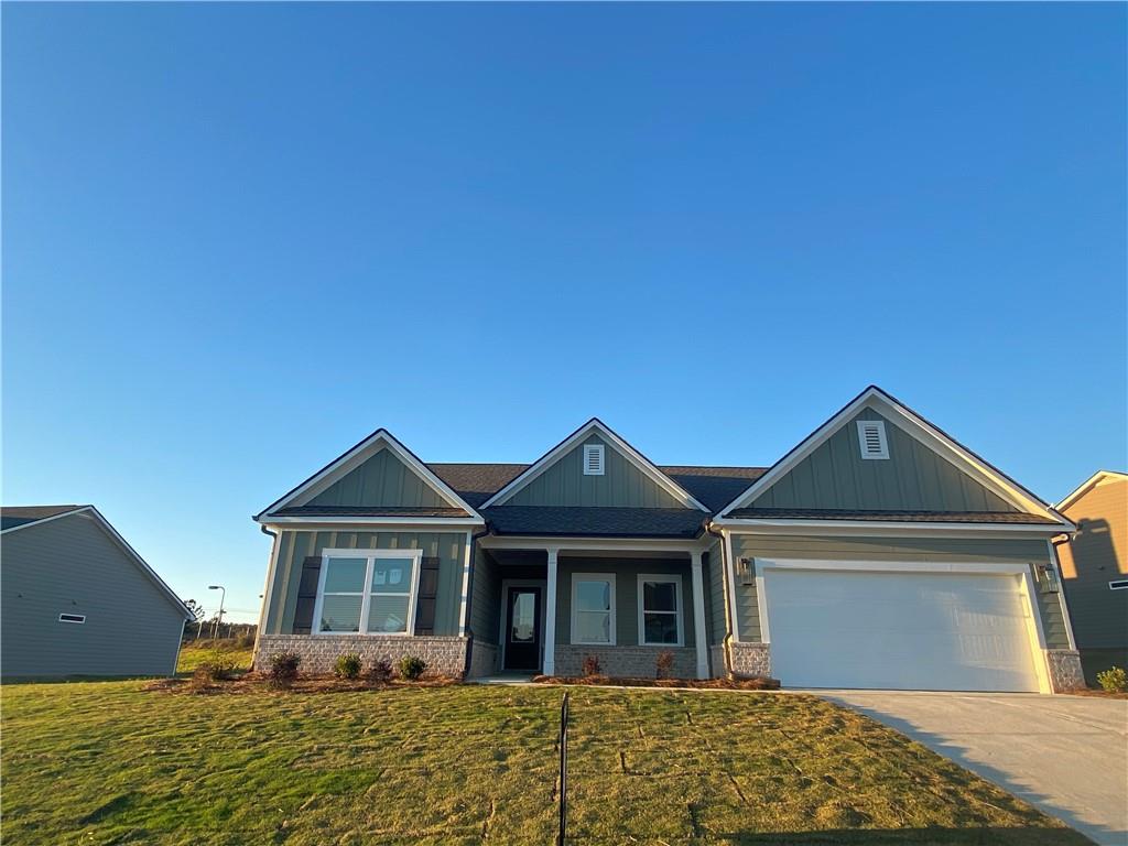 a front view of a house with yard