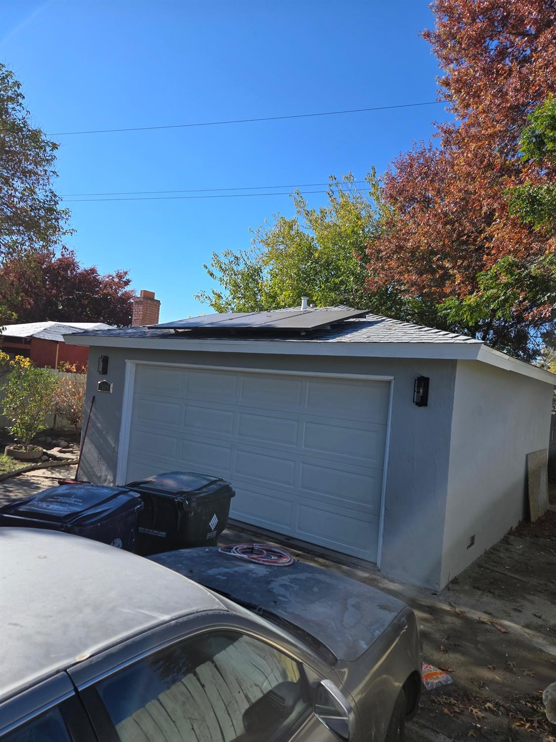 a view of backyard with cabin