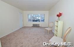 a view of livingroom with furniture and window