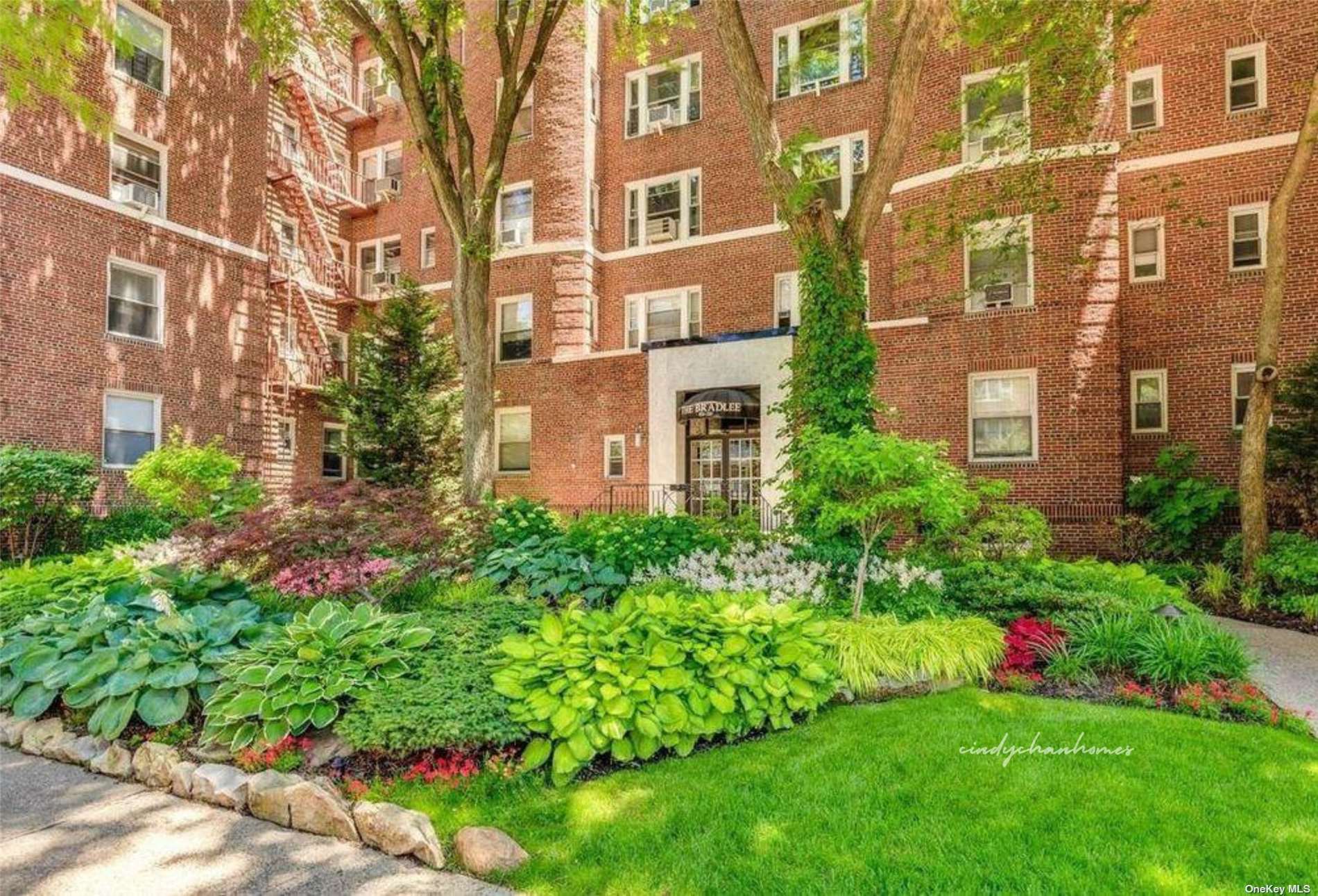 a view of a building with a garden