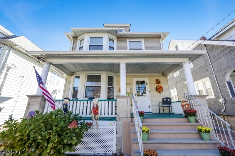 a front view of a house with a porch