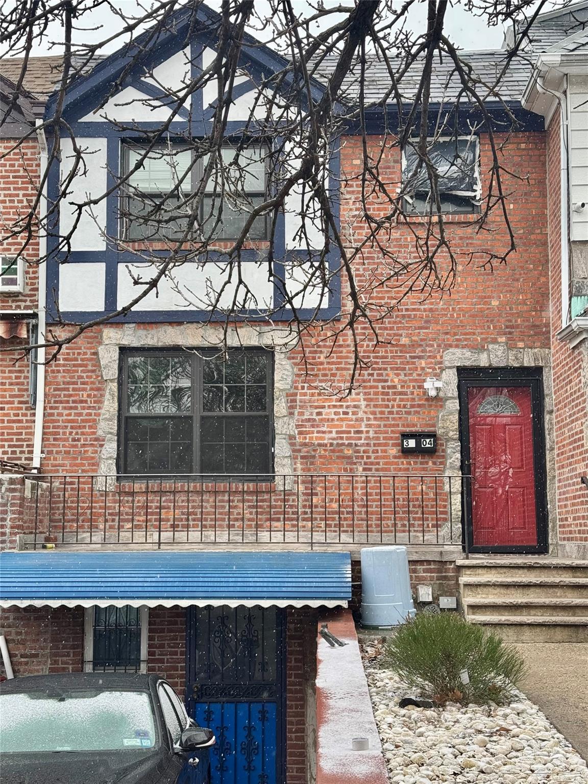 View of front of home featuring a balcony