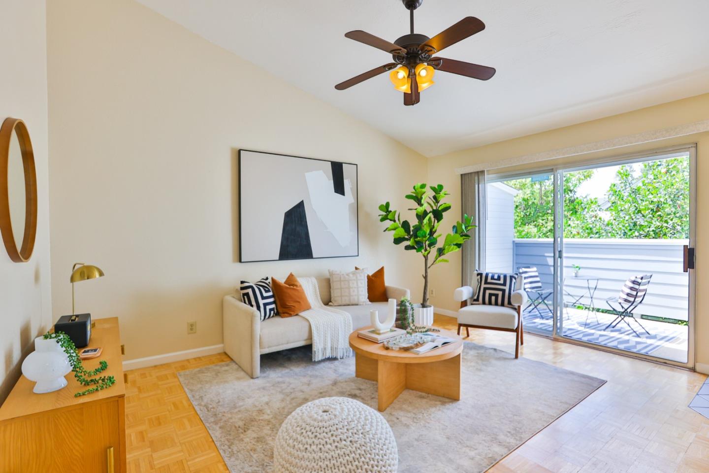 a living room with furniture and a window