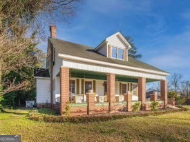 front view of house with a yard