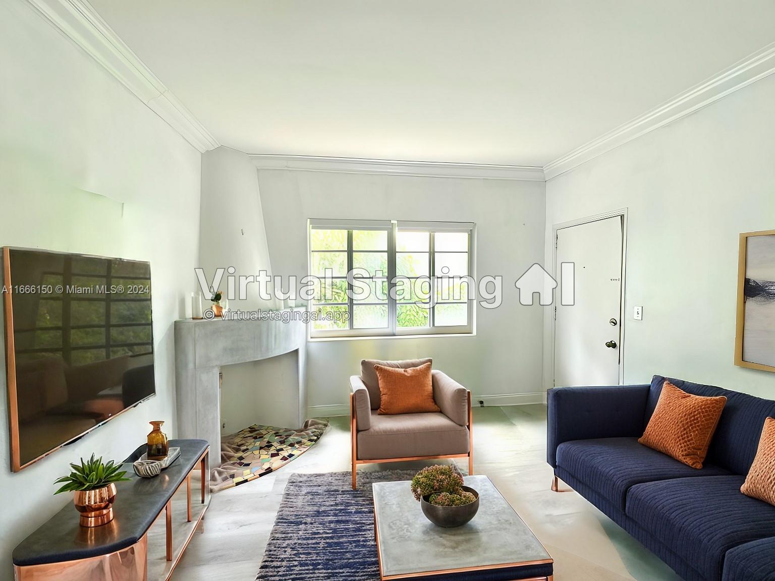 a living room with furniture wooden floor and a fireplace