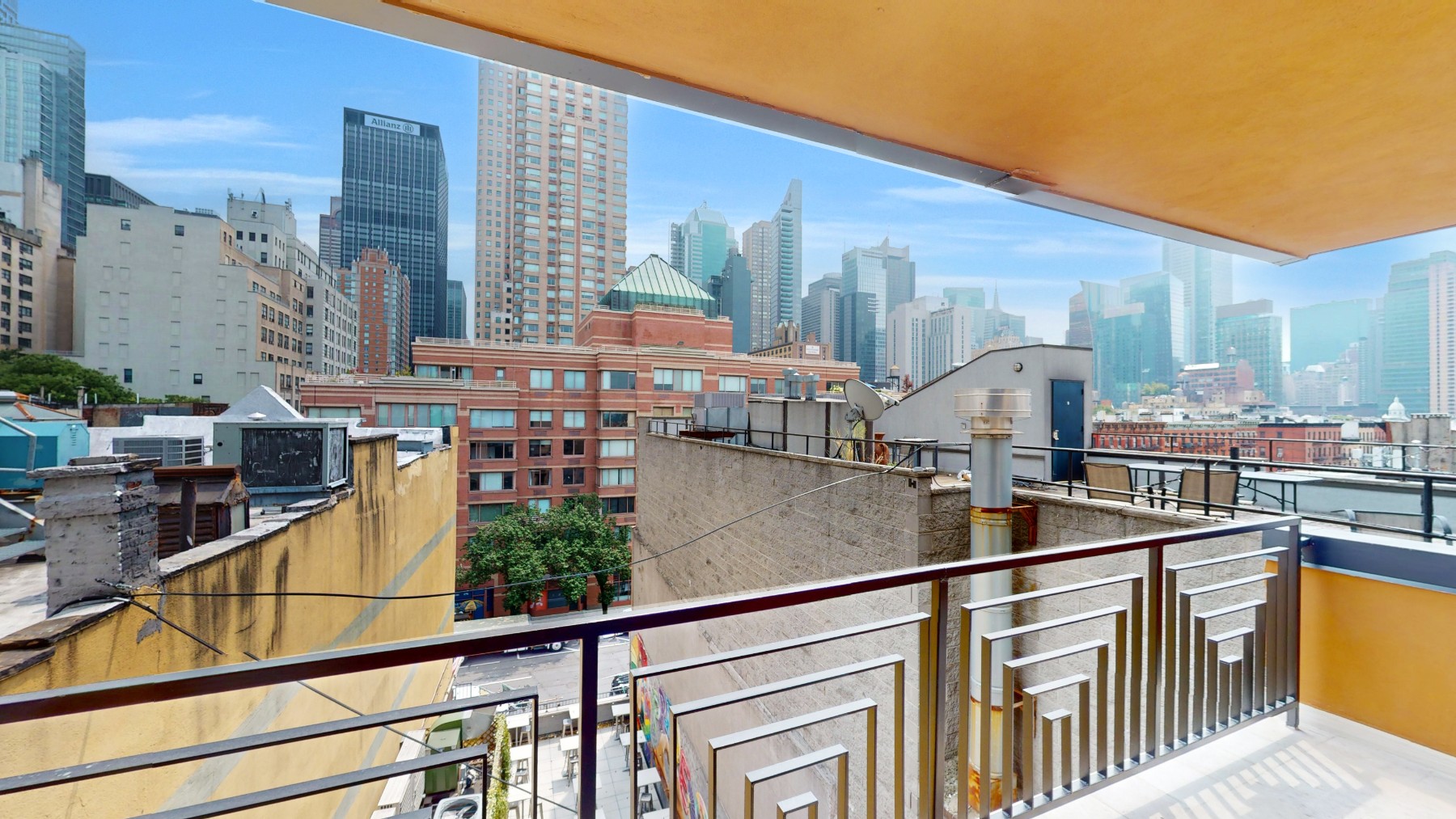 a view of a balcony with chairs