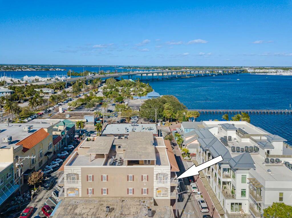 an aerial view of a house with a ocean view