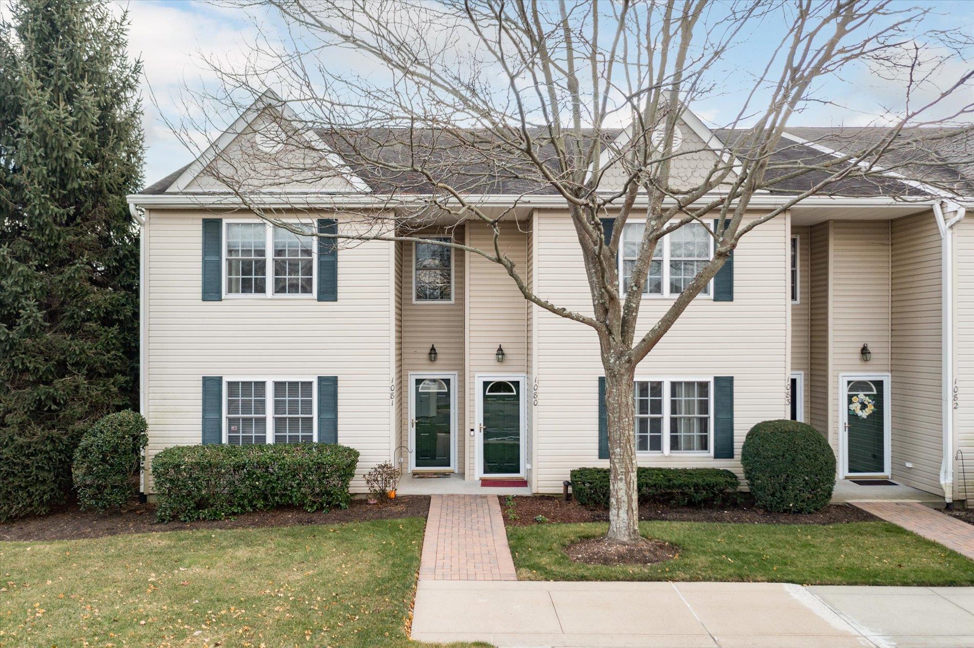 View of front of property with a front lawn