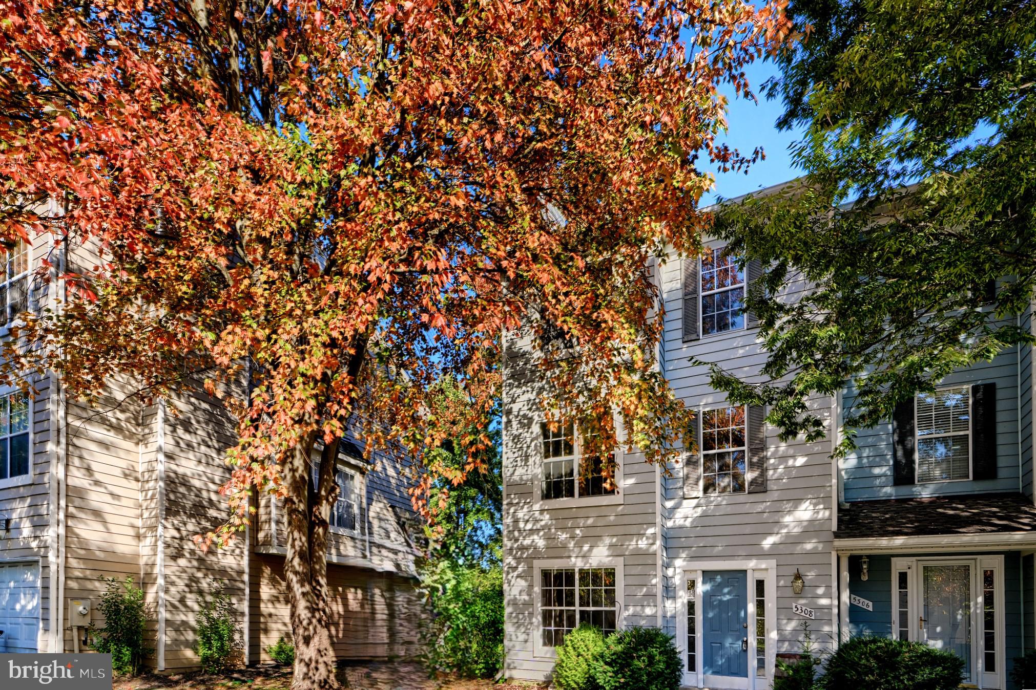 a view of a building with a tree