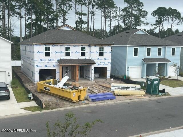 a front view of a house with swimming pool