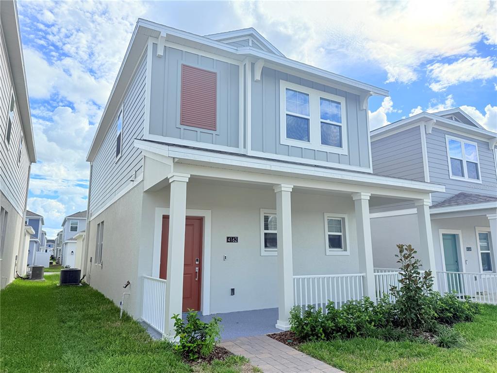 front view of a house with a yard