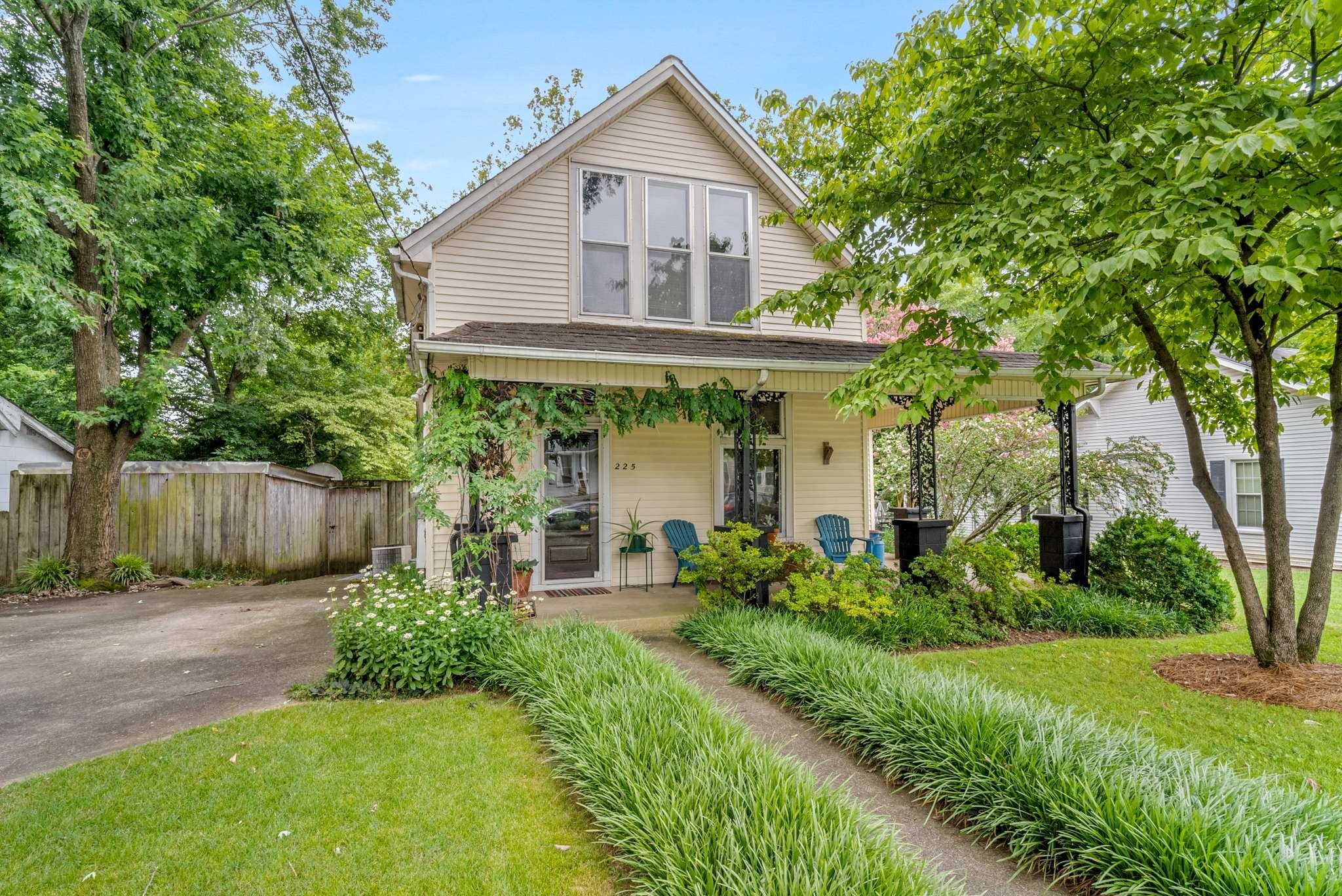 a front view of a house with garden