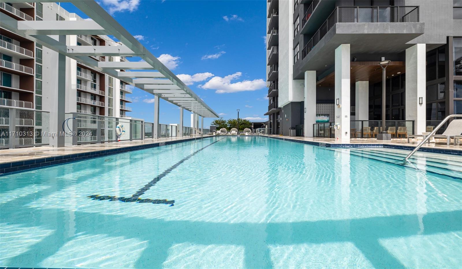 a view of a patio with swimming pool