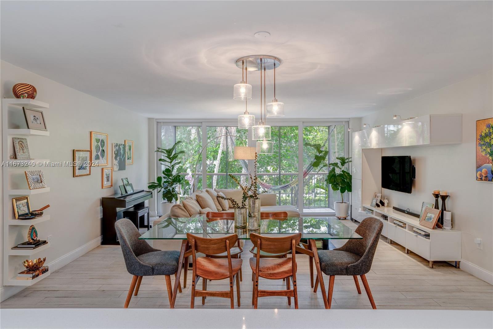 a view of a dining room with furniture window and outside view