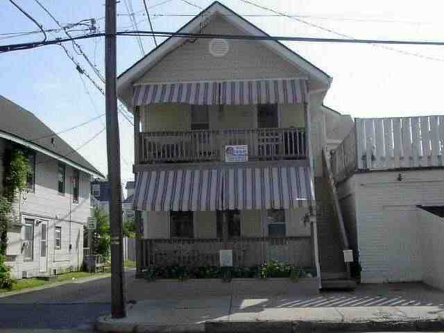 a front view of a house with a garage