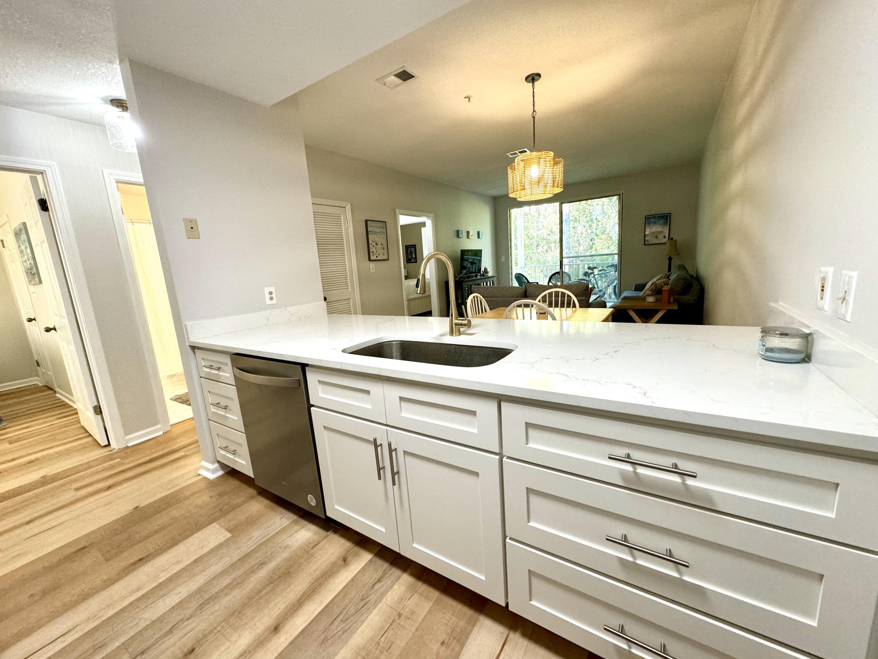 a view of a bathroom sink and a mirror