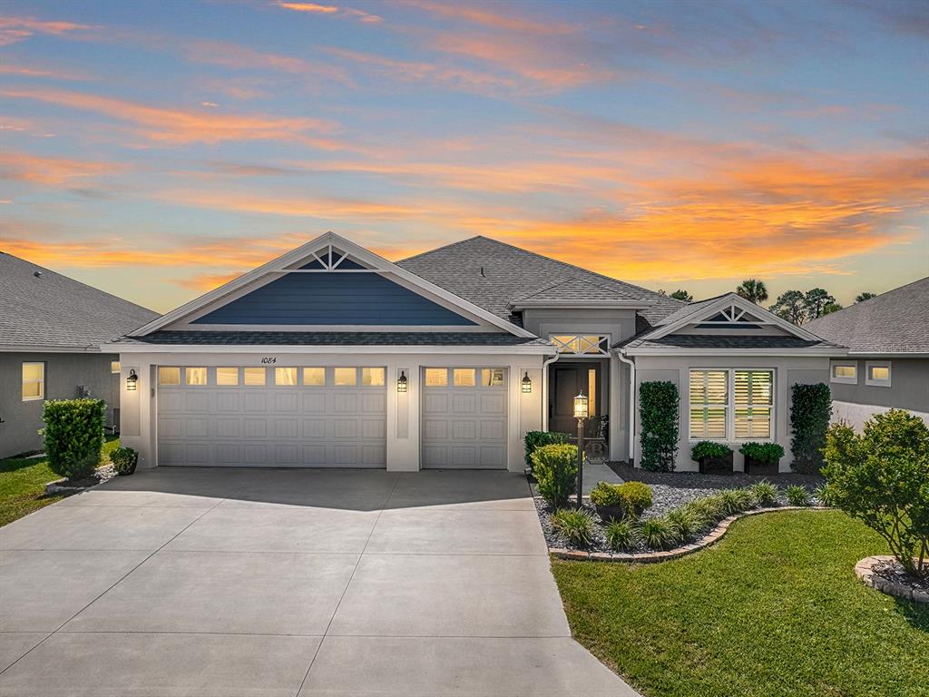 STUNNING 3/2 EXPANDED IRIS WITH SALTWATER HEATED POOL & SPA WITH 2 CAR+ 2 GOLF CART EXPANDED GARAGE LOCATED IN THE VILLAGE OF BRADFORD.