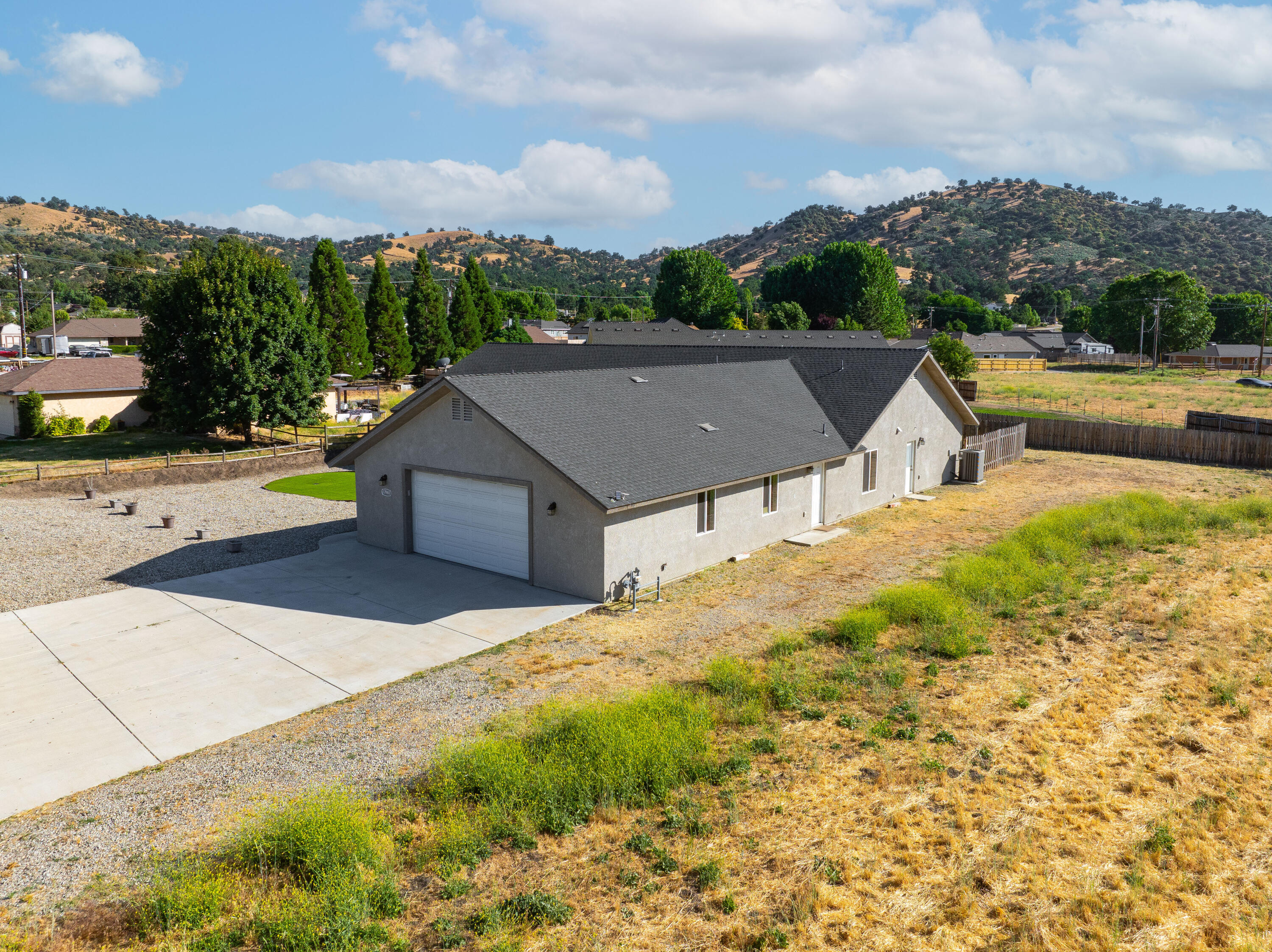 a house with trees in the background