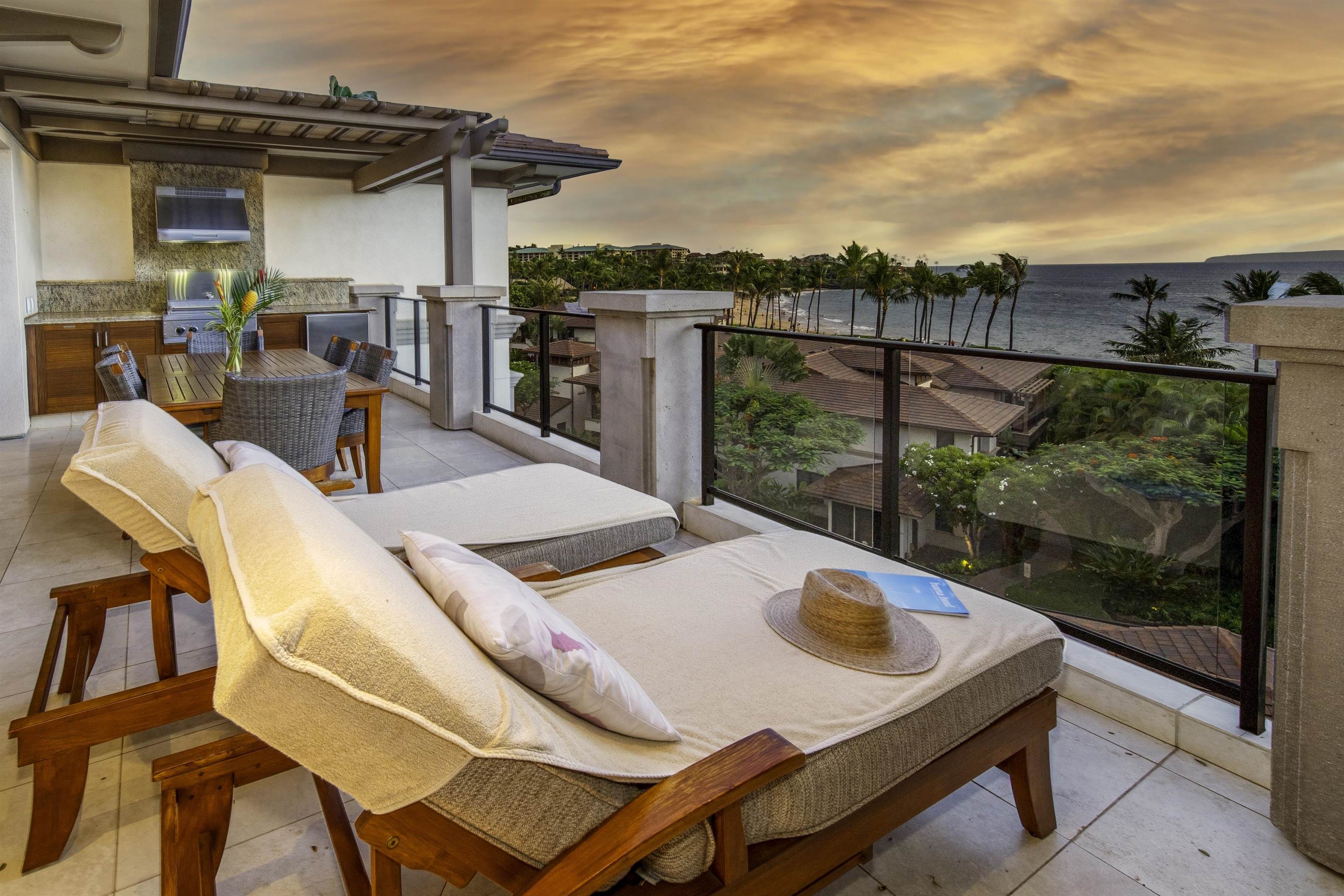 a view of a patio with table and chairs a barbeque grill with wooden floor and fence