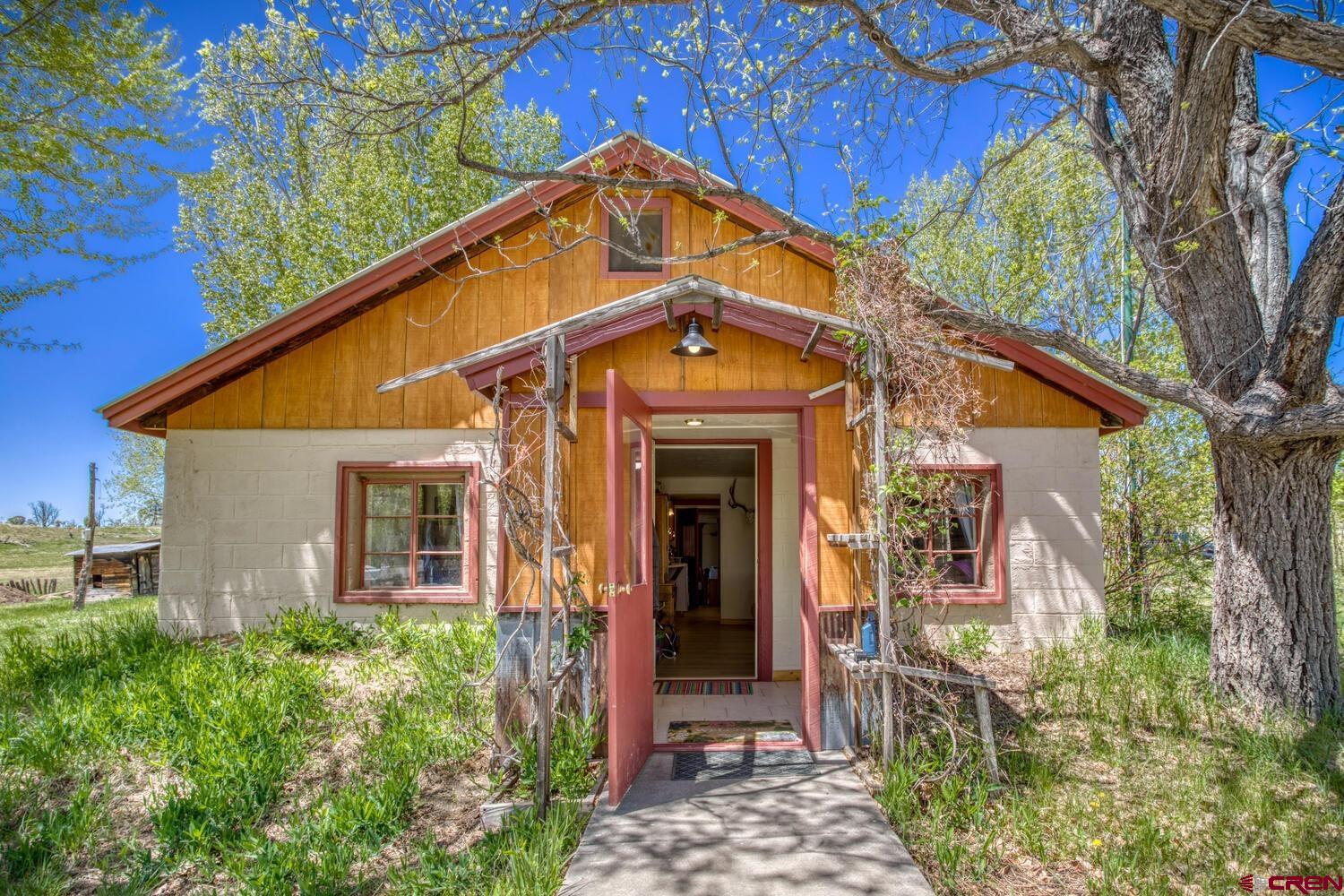 a front view of a house with a porch