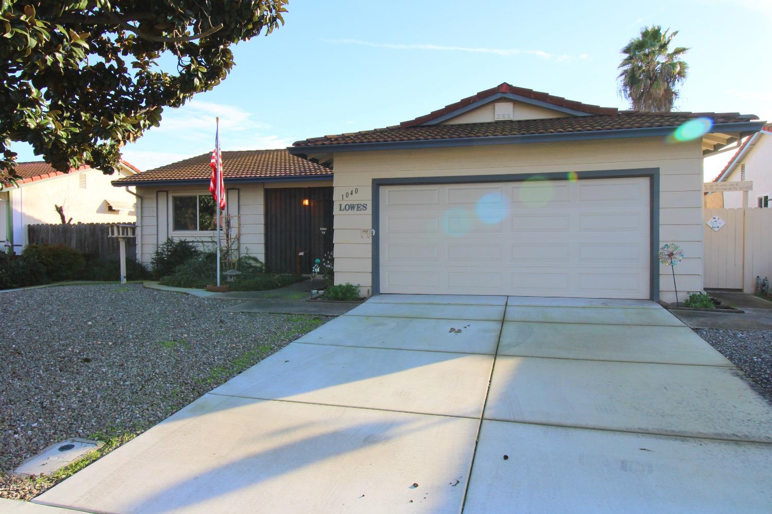 a view of a house with a garage