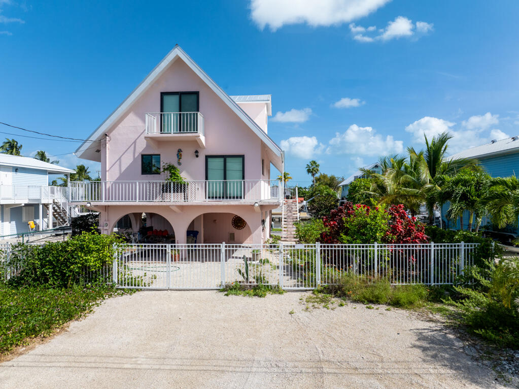 a front view of a house with a porch