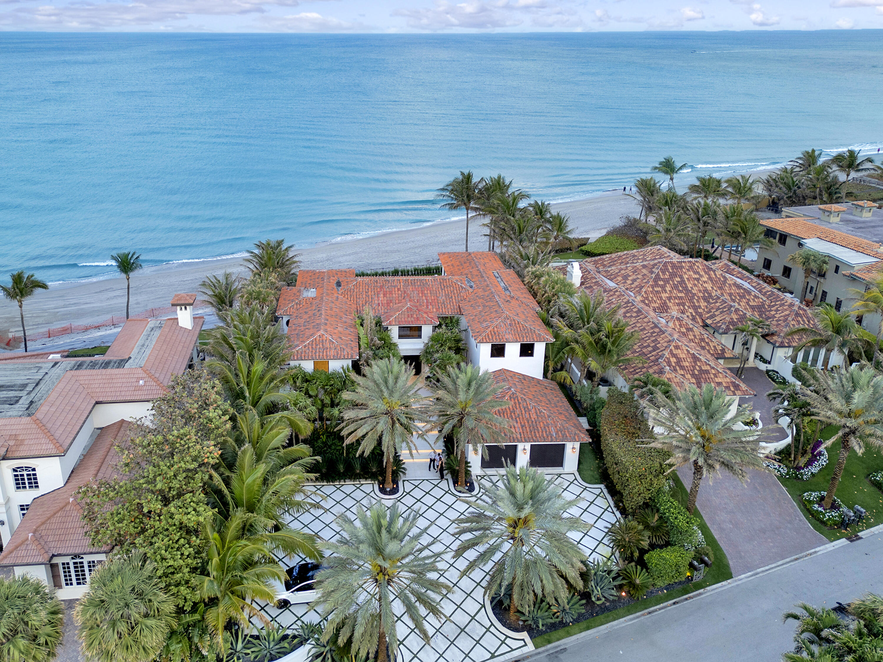 an aerial view of house with ocean view