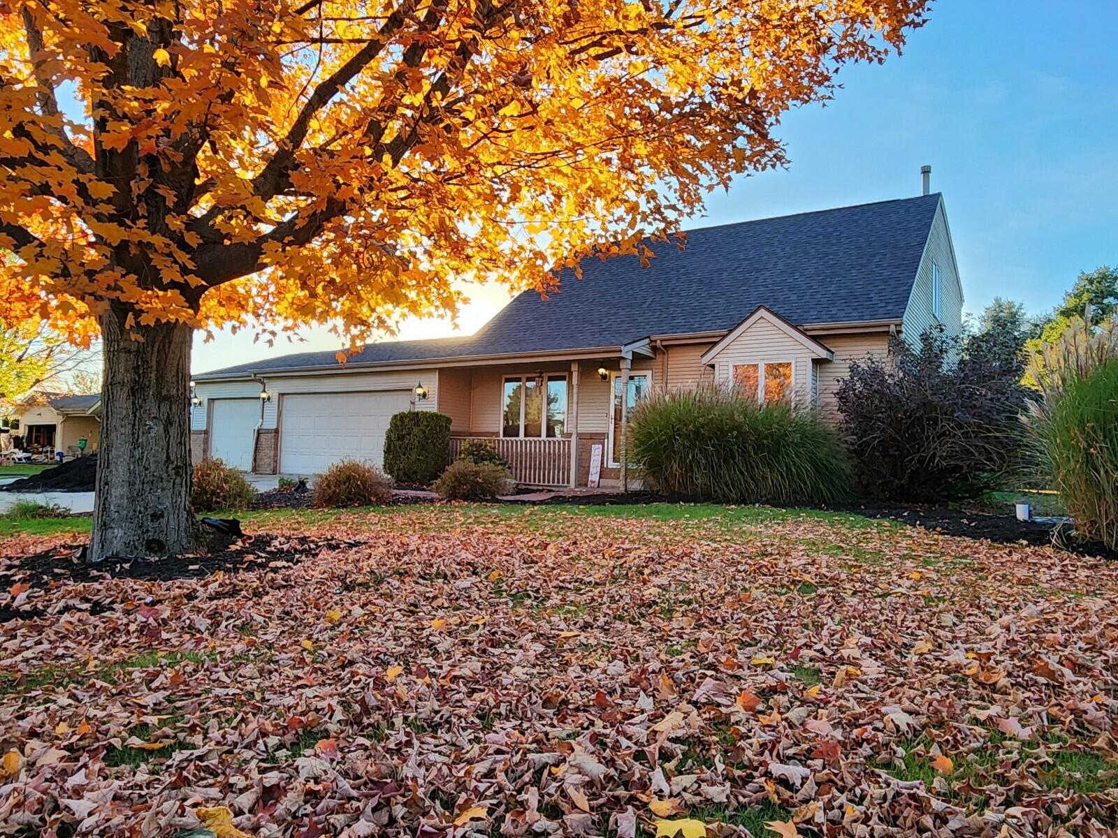 a house with trees in the background