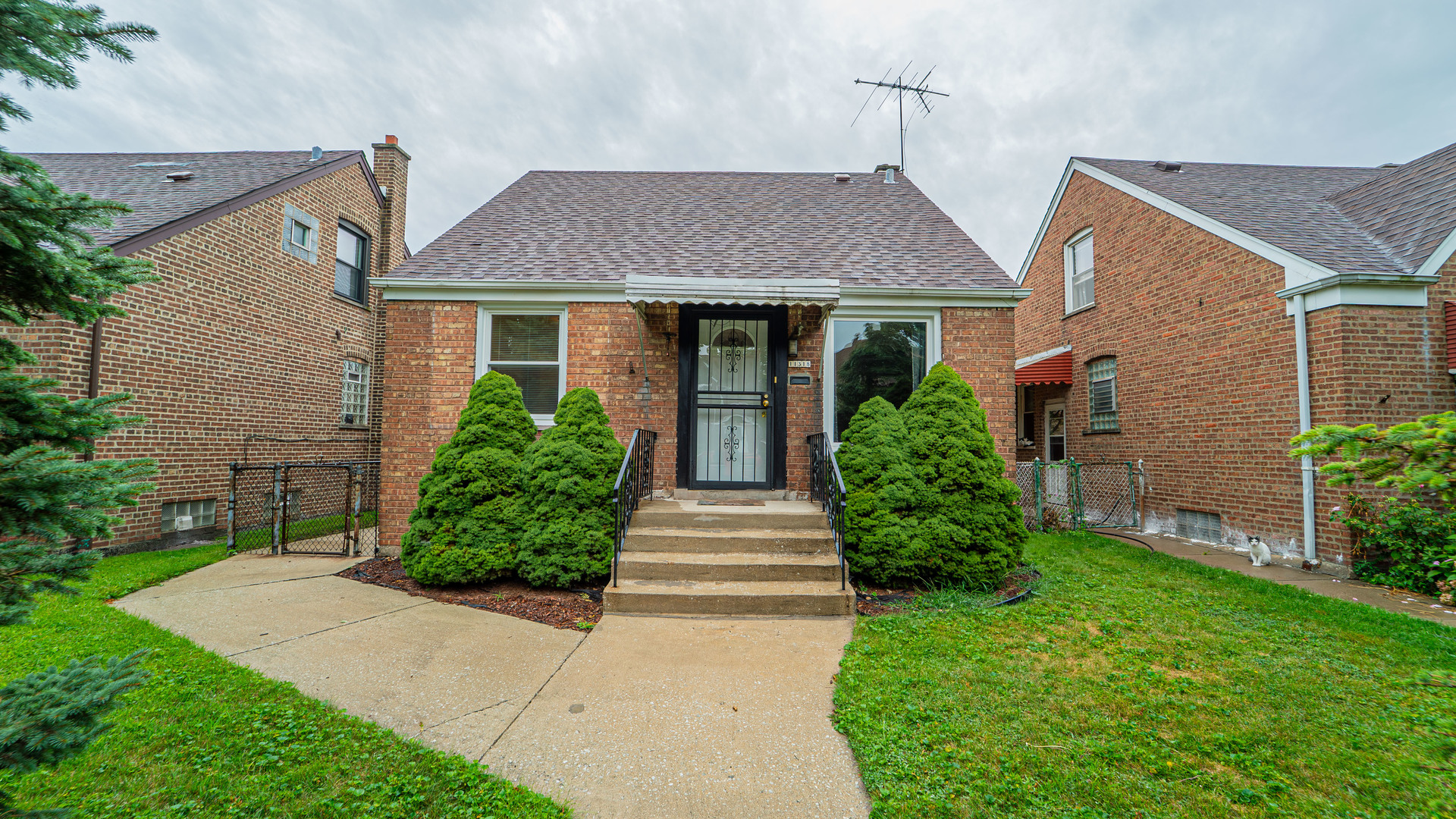 front view of a house and a yard