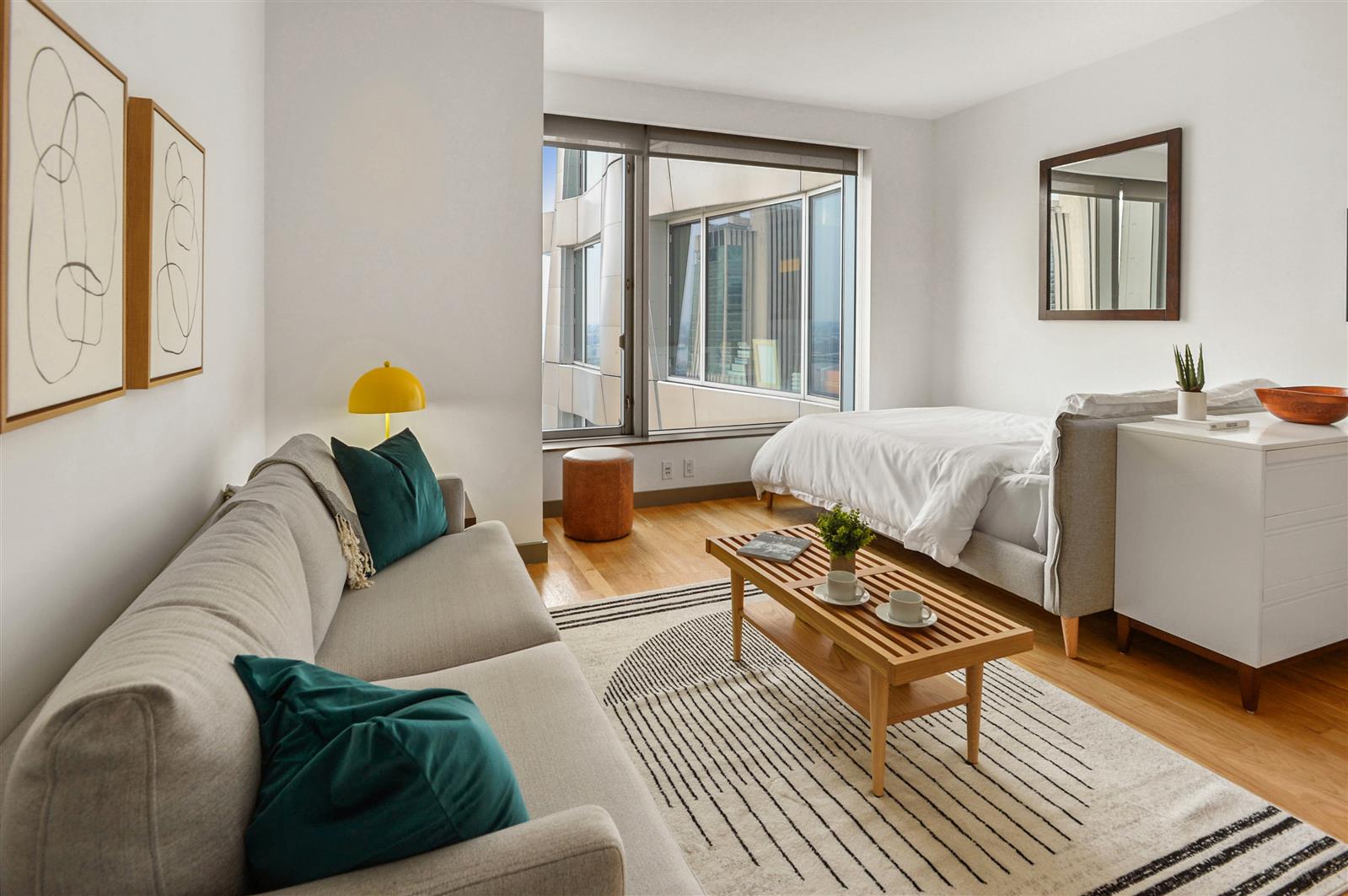 a living room with furniture and a window