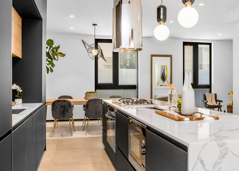 a bathroom with a double vanity sink and a mirror