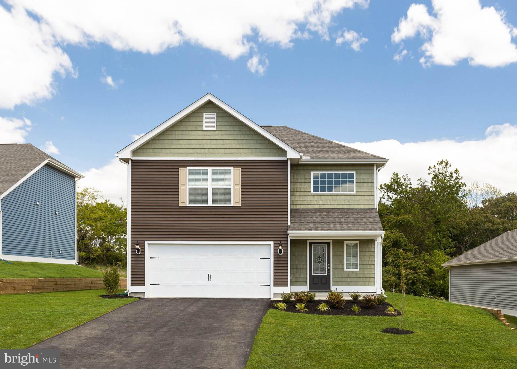 a front view of house with yard