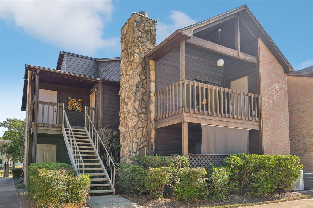 a front view of a house with stairway