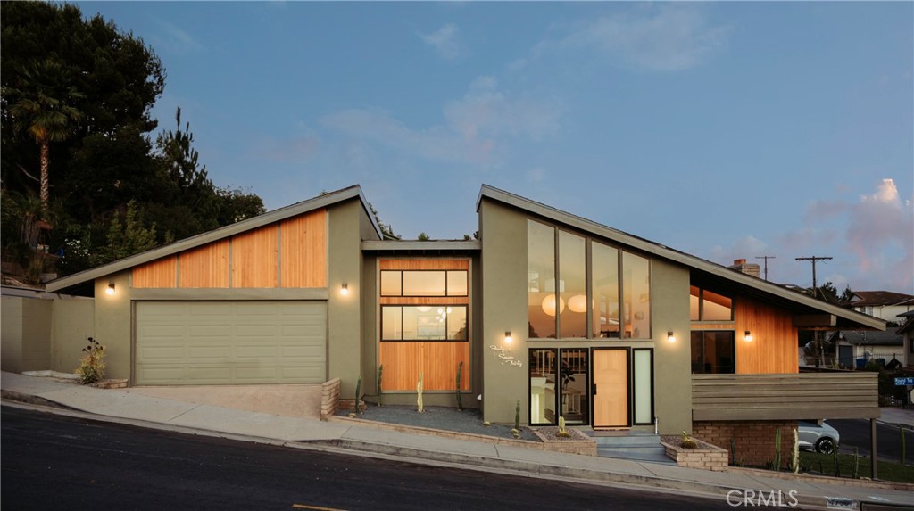 a front view of a house having yard