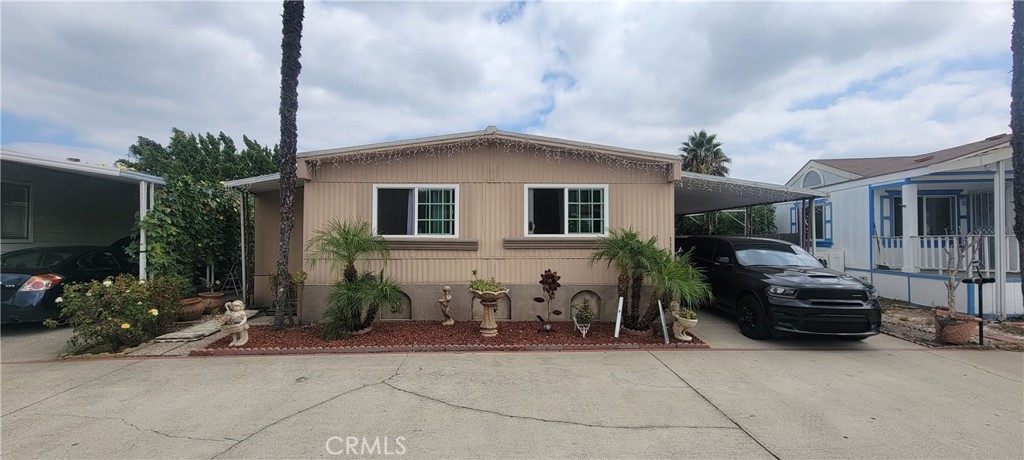 a front view of a house with garage