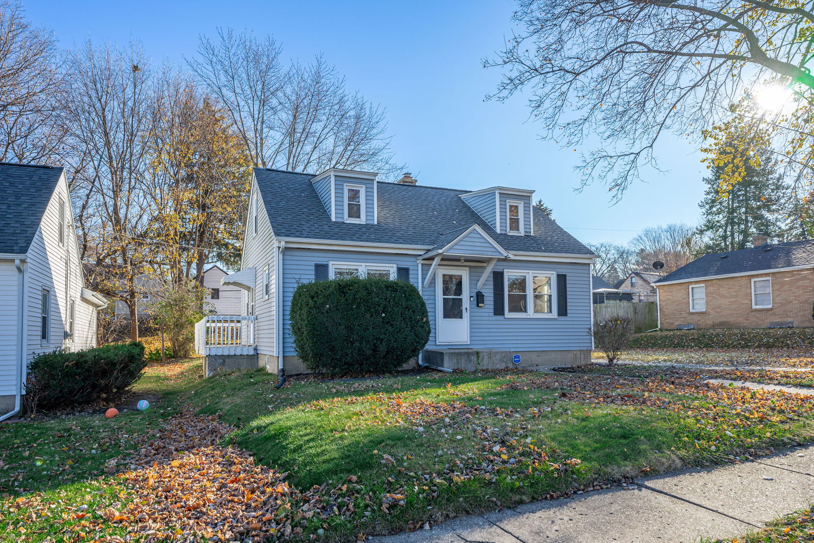 front view of a house with a yard