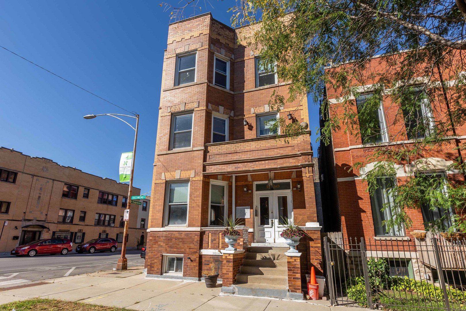 a front view of a building with street view