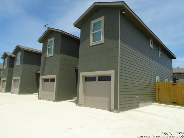 a view of a house with a garage