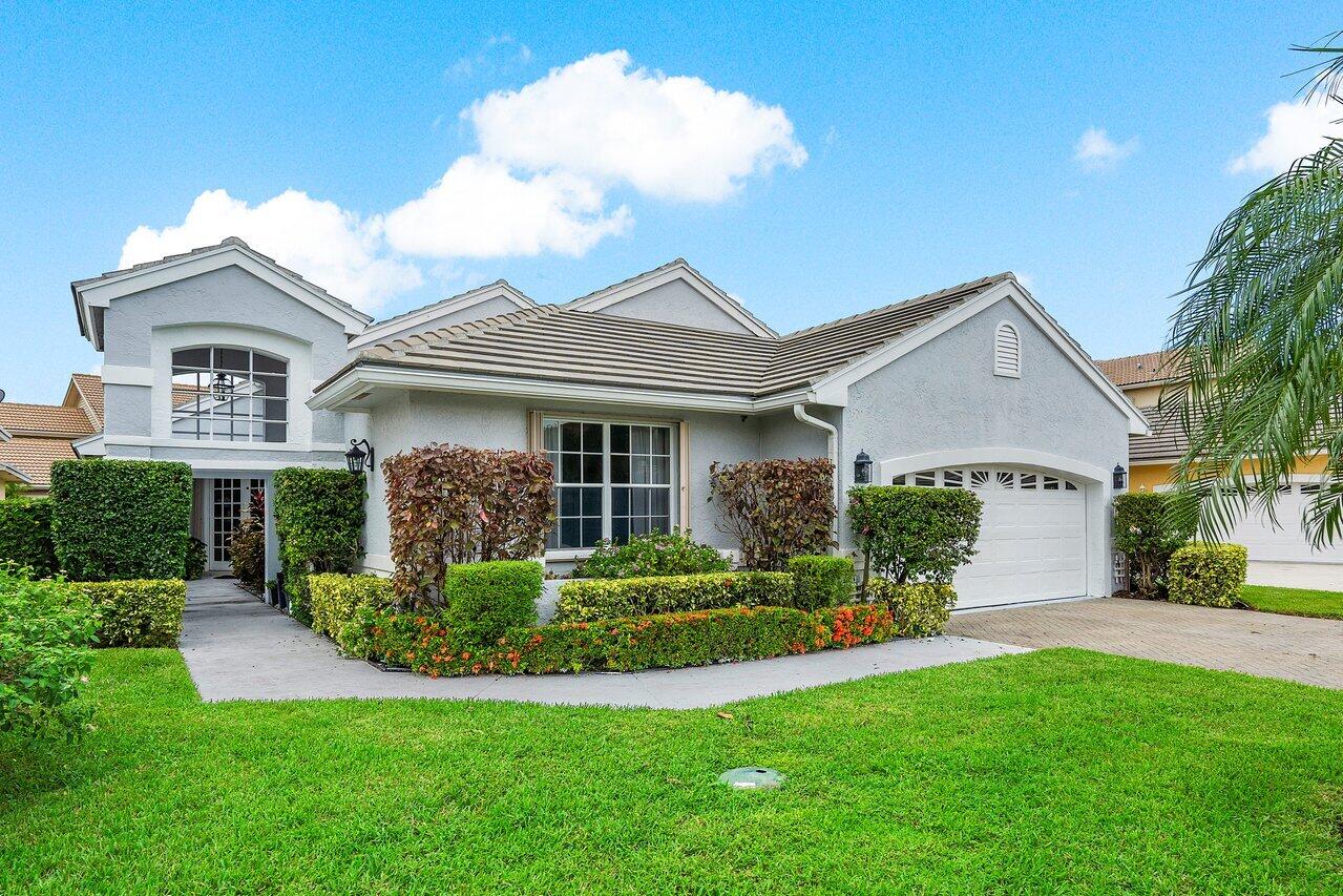 front view of a house and a yard