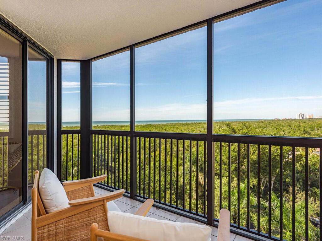 a balcony with furniture