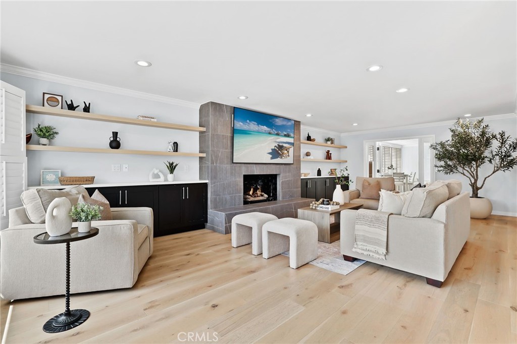 a living room with furniture a fireplace