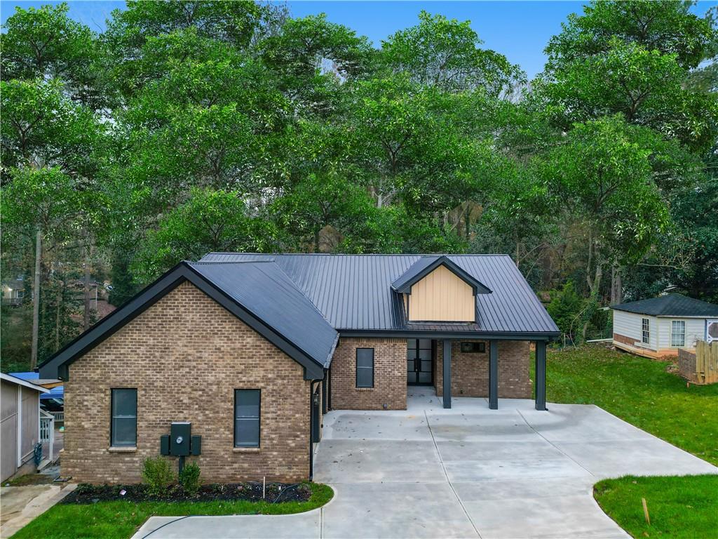 front view of a house with a yard