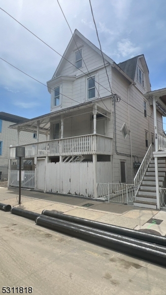 a view of a house with a flat screen tv