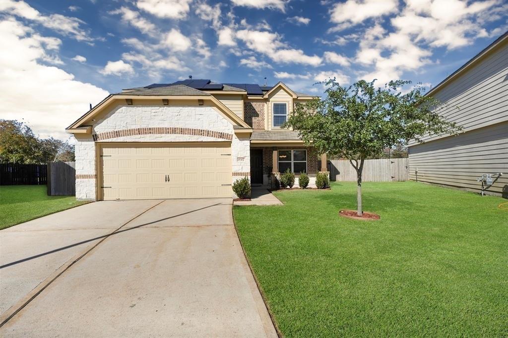 a house view with a garden space