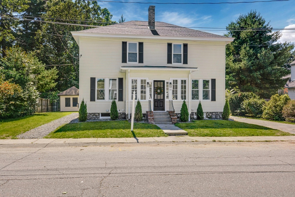 a house view with garden space