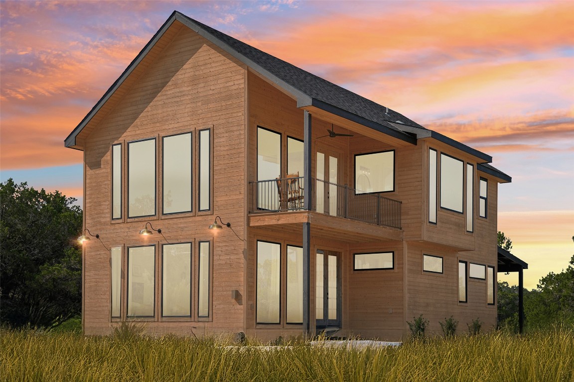 Main cabin, large picture windows allow sunset hill country views.